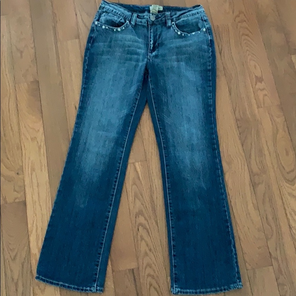 Cute Earl Jeans with studs and decorative pockets.